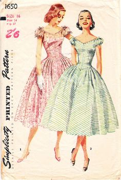 two women in dresses are standing next to each other, one is wearing a white and green striped dress