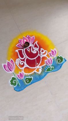 an image of the god ganeshi painted on the floor