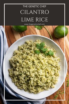 a white bowl filled with cilantro lime rice on top of a wooden table