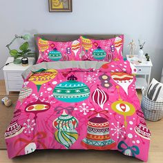 a bed with pink and green decorations on it