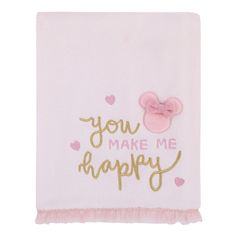 a pink and gold towel with the words you make me happy on it