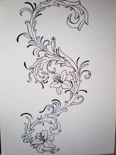 a drawing of a floral design on white paper