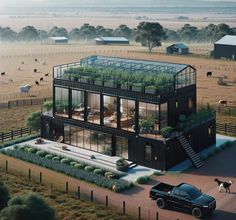 a black truck parked in front of a tall building with plants growing on it's roof