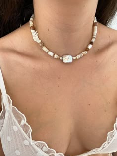 "Welcome to my store! I invite you to enjoy our massive holiday gift sale!! Up to 20% off + free worldwide shipping!! Summer style Pearl choker necklace for women with gemstones and freshwater pearls. Perfect with a summer dress or even with an everyday t-shirt! The whole necklace is handmade from real stones and natural pearls, which makes each necklace unique. In the center of the necklace is a large, natural square pearl in a purple-delicate pink color. ♦ Materials ♦ - Goldfilled- Closure and connections - natural pearls - real stones - Raw shell beads ♦ Dimensions ♦ -  Necklace length 14.76 \"(37.5 cm)  +2\" (5 cm) extension chain for comfortable wearing NOTES ♦ Each jewelry item is expertly handcrafted with great care and completed as swiftly as possible, typically within 1-5 business Gemstone Beads Pearl Necklace, Adjustable Gemstone Beads Pearl Necklace, Natural Stones Shell Necklace As A Gift, Bohemian Pearl Choker, Gemstone Choker Necklace, Shell Beads Necklace, Necklace Shell, Shell Choker, Gemstone Choker