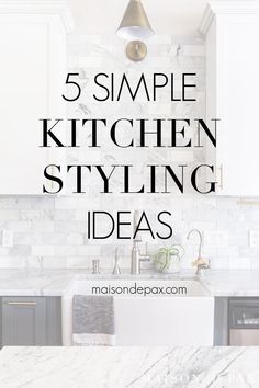 the words 5 simple kitchen styling ideas in black and white with marble countertops, cabinets,