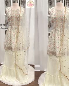 size 38 Product Name: Beautiful Ivory Color Sharara Set with Multicolor Sequin Work Description: Indulge in sheer elegance with our Beautiful Ivory Color Sharara Set featuring exquisite multicolor sequin work. This stunning ensemble exudes sophistication and charm, perfect for those special occasions that demand attention. The ivory color adds a touch of grace, while the intricate multicolor sequin detailing elevates the outfit's allure. The set includes a beautifully designed kurta-style top an Fitted Cream Palazzo Set With Dupatta, Multicolor Palazzo Set With Mirror Work For Reception, White Designer Palazzo Set For Festive Occasions, Festive Designer White Palazzo Set, Festive White Designer Palazzo Set, Fitted Cream Georgette Sharara, Designer White Palazzo Set With Intricate Embroidery, Designer Embellished White Palazzo Set, Fitted Cream Sharara With Mirror Work