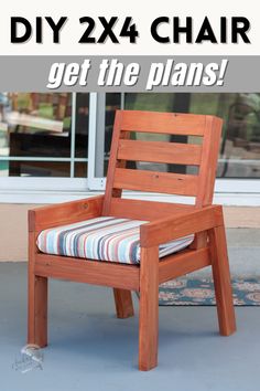 a wooden chair sitting on top of a sidewalk next to a store front window with the words diy 2x4 chair get the plans