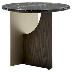 a round table with a marble top and wooden base