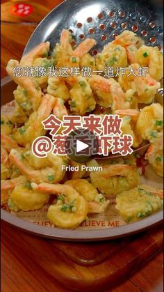 fried prawn on a plate with chinese words in the background and an image of a