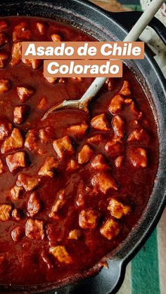 a skillet filled with meat and sauce