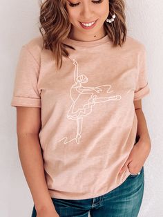 "This dance shirt is perfect for your Dance or Ballet Class, or as a gift for your favorite Dance Instructor, ballerina or dancer in your life! H O W - T O - O R D E R - Be sure to review the size chart in the photos before making your selection.  - Select your size and color from the drop-down menus. - Click the \"Add to Cart\" button, then proceed to check out once you have added all of your items M A T E R I A L S Made from specially spun fibers that a make very strong and smooth fabric that Ballet Shirt Ideas, Relaxed Fit T-shirt For Dance With Short Sleeves, Pink Balletcore Tops For Spring, Casual Summer T-shirt For Dance, Casual Tops For Summer Dance Class, Casual Summer Tops For Dance Class, Relaxed Fit Tops For Summer Dance, White Casual Dance Top, White Casual Tops For Dance