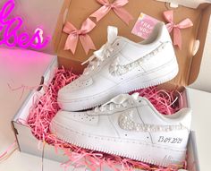 Make your day extra special with these beautiful and unique custom bridal sneakers! * Brand New 100% Authentic sneakers! * FREE SHIPPING within the US territory!  * Rhinestones/pearls Swoosh Bridal Custom made-to-order sneaker. * Hand-painted lettering on the outer sides of each shoe. Get them Personalized! - Size Guide- C (Child) Y (Youth) W (Women) M (Men.) - Acrylic Waterproof paint - ALWAYS Hand-Pianted, we never use stickers to make sure the shoes last a long time! - Available in Low, Mid, and High styles. - 100 % Authentic products purchased from the original retailer - The sizes are unisex so please don't panic if, for example, you order a 6.5 M and receive an 8 W, THEY ARE EXACTLY THE SAME SHOES and will fit the same. Please refer to the Size Guide. - NO RETURNS. Custom shoes are m Luxury White Custom Sneakers With Branded Heel, Luxury Cream Custom Sneakers With Cushioned Footbed, White Custom Sneakers With Rhinestones For Wedding, Custom Wedding Sneakers With Rhinestones, Wedding Custom Sneakers With Rhinestones And Round Toe, Air Force 1 Wedding, Sneaker Wedding, Wedding Shoes Sneakers, Bridal Sneakers