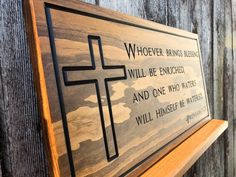 a wooden plaque that says whoever brings strength, will be encrved and one who waits will himself be with god