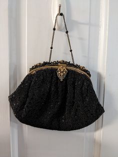 This is a beautiful vintage beaded purse.  Nicely decorated top and all the beads are tight. It has a light little handle pictured and the snap closure works great. Made in France 1920-1940s.  Size 7 inches tall by 6 inches wide. Antique Beaded Bags For Vintage Events, Antique Beaded Evening Bag, Antique Beaded Evening Bag For Party, Vintage Beaded Evening Bags, Antique Beaded Evening Bag For Formal Events, Vintage Beaded Formal Bags, Vintage Beaded Bags For Formal Occasions, Antique Beaded Bags For Formal Occasions, Black Purse