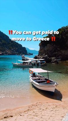 there are boats on the beach and one boat is in the water with words above it that says you can get paid to move to greece