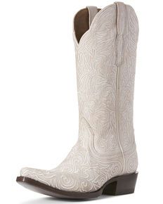 a pair of white cowboy boots on a white background