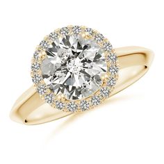 a yellow gold engagement ring with an oval diamond center