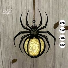 a spider lamp hanging from a wooden wall with the words svg df png