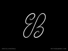 the letter b is written in cursive writing with white ink on a black background