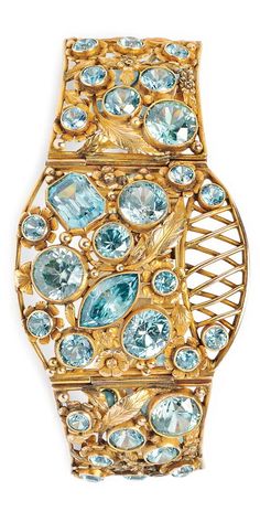 Arts & Crafts 10kt Gold and Blue Zircon Bracelet, designed as a flower basket with hinged panels each set with fancy- and circular-cut blue zircons, 38.9 dwt, interior cir. 7 in. 1920 Dress, Zircon Bracelet, Jewelry Sale, Gold And Blue, Crafts Jewelry, Prairie Style, Mission Style, Cz Jewelry