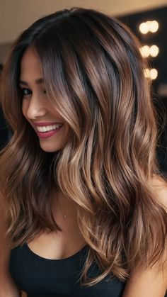 Unleash Your Inner Goddess with These 15 Fall Balayage Trends 32 Blonde To Brunette Fall Hair, Fall Balayage Dark Hair, Chestnut Bronde Balayage, Brunette Balayage Hair Fall 2024, Ombré Hair Brown To Blonde, Foilage Technique Hair, Caramel Mocha Balayage, Balayage Hair Fall, Dark Roots Light Ends Brunettes