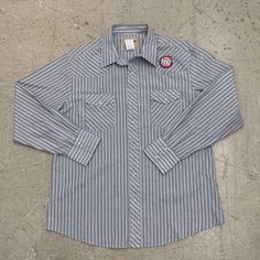 New Wrangler Shirt Mens Xl Gray Striped Metallic Pearl Snap Work Western Nwt Good Condition. Majority Of My Items Are Used. Check Photos Carefully. I Will Do My Best To Photo Any Blemishes That Are Hidden. Please Note, Item Measurements Are Approximate And Listed Within The Photos And Item Specifics. Previous Washing May Change The Sizing. Please Compare The Measurements In The Photos To Your Favorite Garments In Ensure Fit. These Photos Are Taken With No Filters. The Item You See Is The Closest Wrangler Shirt, Wrangler Shirts, Grey Stripes, Casual Shirts For Men, Casual Button Down Shirts, Mens Shirts, Man Shop, Grey