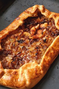 a large pastry sitting on top of a pan