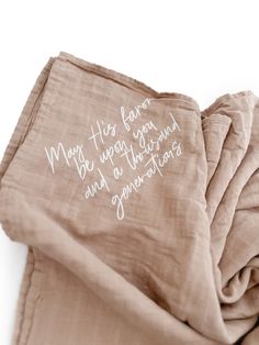 a piece of cloth with writing on it