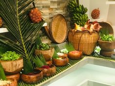 there are many different types of plants in baskets on the shelf next to each other