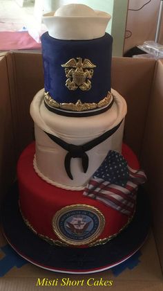 this is a cake in the shape of an american flag and coat of arms on top