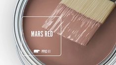 a close up of a paint can with the words mars red on it