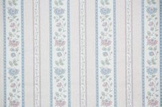 an old fashioned wallpaper with flowers and stripes on the side, in pastel colors