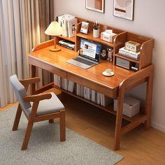 a wooden desk with a laptop on top of it next to a chair and window