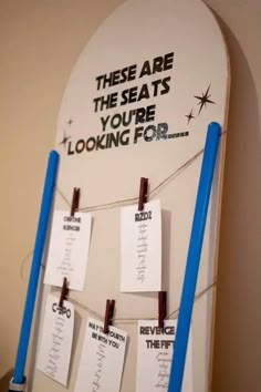 a surfboard with notes attached to it and some writing on the board that says, these are the seats you're looking for