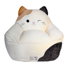 a cat shaped dog bed with a white background