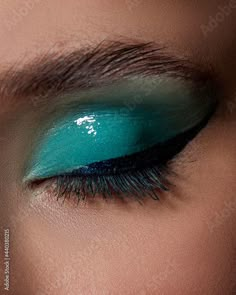 Stock Image: young woman with blue eye shadow makeup Dark Turquoise Makeup, Plastic Photoshoot, Bailey Prado, Blue Eye Shadow Aesthetic, Blue And Green Eyeshadow, Black And Teal Eyeshadow, Blue Ocean Makeup Looks, Aqua Blue Eyeshadow, Teal Eyeshadow