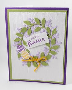 a handmade easter card with purple and green accents