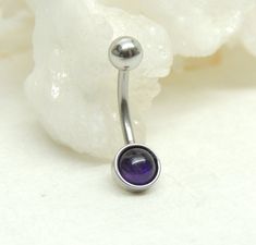 Amethyst Belly Ring Show off your beautiful belly! Simple non dangle style belly ring features a natural amethyst gemstone cabochon. The true beauty of these stones is hard to capture in photographs and is much more beautiful in person. Belly button ring measures 1 inches long total length. Barbell is 14g surgical steel with a 10mm wearable bar length. Top ball measures 5mm, bottom measure 6mm. All jewelry comes in a gift box for safe keeping or ready for gift giving. For Belly Button Rings: htt Ear Piercings Chart, Belly Button Piercing Jewelry, Belly Button Jewelry, Dangle Belly Rings, Cute Piercings, Belly Jewelry, Button Rings, Belly Piercing, Belly Button Ring