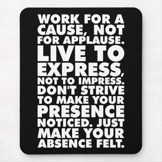 a black and white mouse pad with words on the front saying work for a cause not for applause live to express