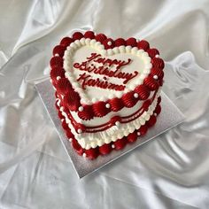 a heart - shaped cake with the words happy valentine's day written on it