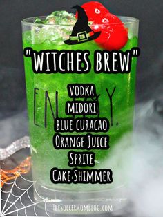 witches brew cocktail with vodka and blue curacao orange juice, spritee cake slimmer