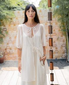 We are all about the Dynasty Sheer Top with our Dora Slip available on our website. Elevated Bohemian Fashion with an elegant touch. White Clothing, Resort Fashion