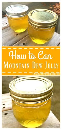 two jars filled with yellow liquid sitting on top of a wooden table