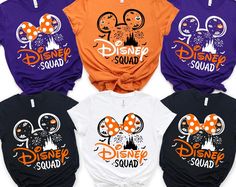 four disney squad shirts with mickey mouse ears on the front and minnie's head on the back