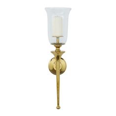 a gold wall light with a white candle on the top and bottom half of it