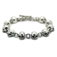 SKU: i3698 Beautiful bracellet with skull and bones parts. Features: Brand new sterling pendant silver 925. Not plated, 100% solid silver metal! The average weight of the product - 57.0 g. (22.5cm Lenght); Processing - Blacked oxidation; Availability of proprietary tag manufacturer - Yes; Country of origin - Ukraine; FAQs about Bracelet Fit - https://www.overstock.com/guides/faqs-about-bracelet-fit More products on www.indigo.jewelry Online Cataloque www.indigo.shop Sterling Silver Skull Jewelry With Polished Finish, Sterling Silver Skull Jewelry Hallmarked, Classic Sterling Silver Skull Jewelry, Silver Skull Stainless Steel Jewelry, Silver Stainless Steel Skull Jewelry, Classic Engraved Skull Jewelry, Silver Gothic Skull Bracelets, Bone Jewelry, Skull Bracelet