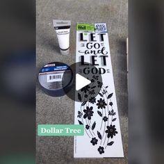 the dollar tree has been decorated with black and white flowers, which are part of an art project