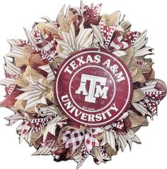 a wreath with the texas army university logo and plaid ribbon around it, on a white background