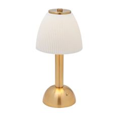 a gold table lamp with a white shade on it's base and a light bulb in the middle