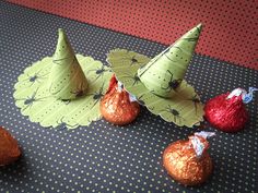 some candy cones are sitting on a table